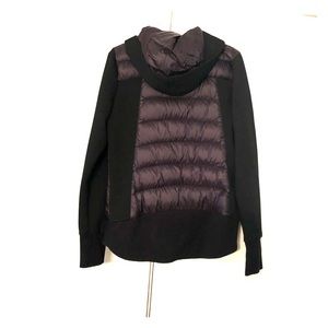 A black Michael Kors Jacket.